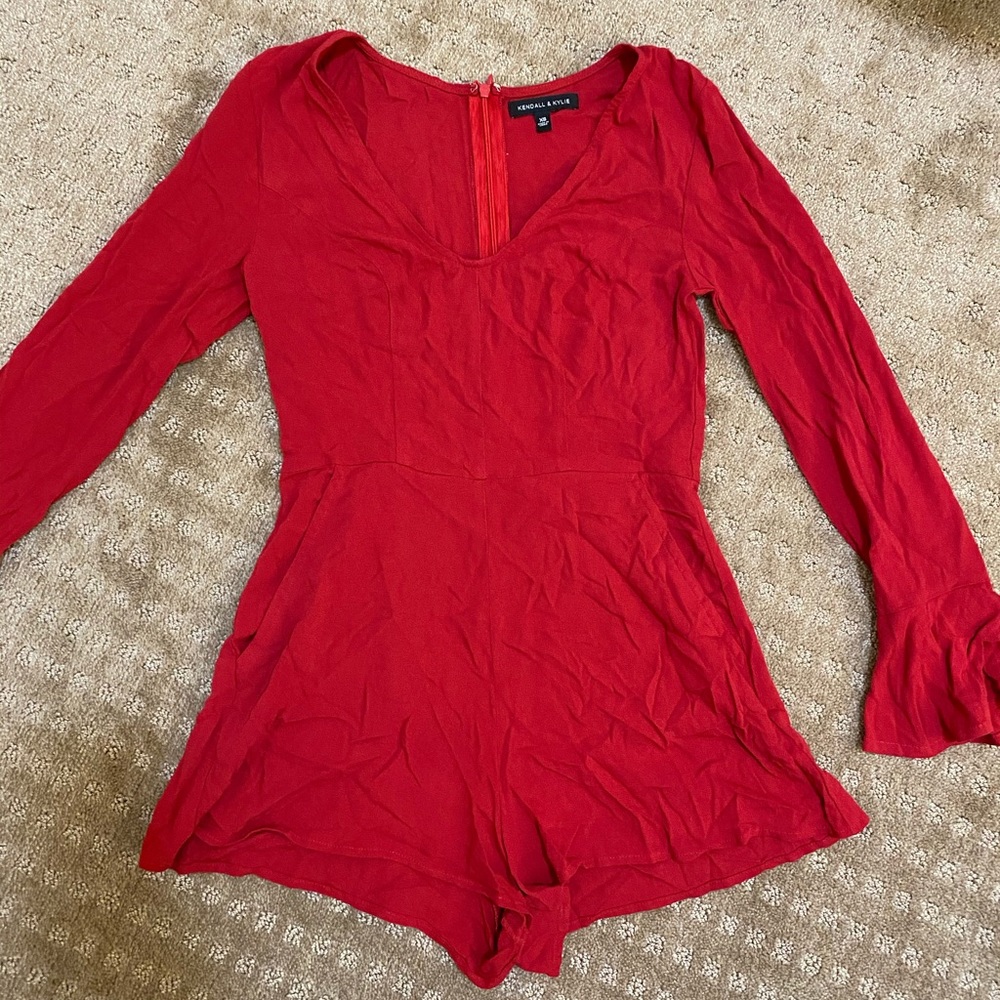 Red long sleeved romper